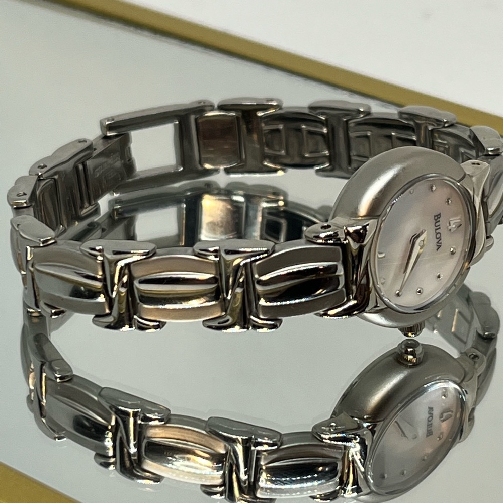 BULOVA!! size 53/4 very elegant silver two tone stainless steel! quality!! Mop